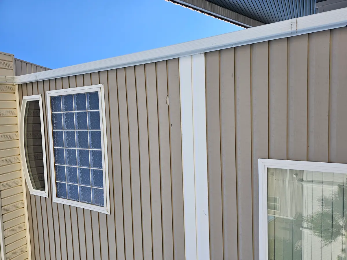 Storm-damaged siding replaced by Hilltop Contracting